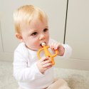 Matchstick Monkey gryzak silikonowy sensoryczny ze szczoteczką Pomarańcz Matchstick Monkey gryzak silikonowy sensoryczny ze szczoteczką Pomarańcz